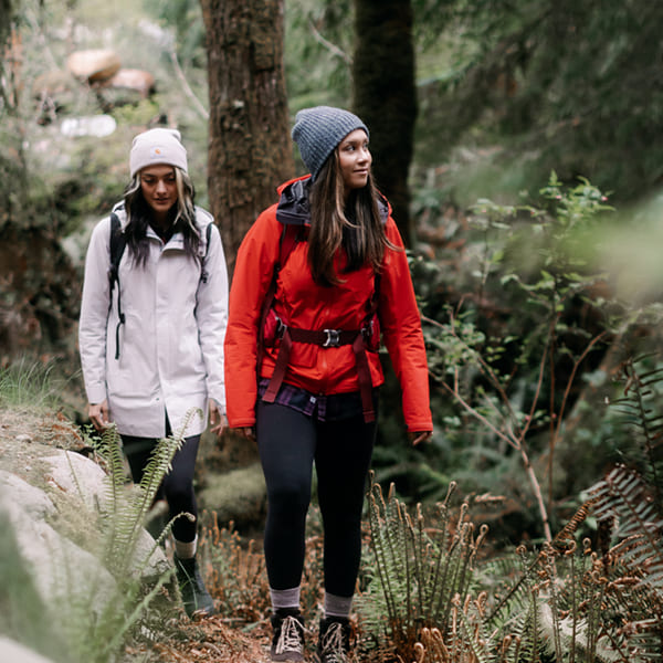 Two women hiking in the forest